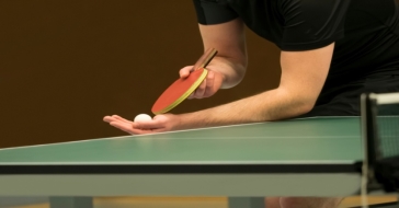 midsection-of-man-serving-while-playing-table-tennis-735961119-59f0b6aeaad52b0010378181.jpg
